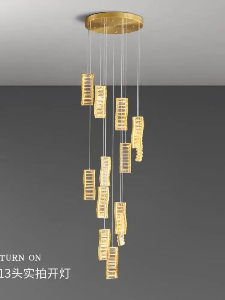 Gold-toned decorbites deluxe crystal spiral slinglights pendant with cascading rectangular crystal pendants for dining room