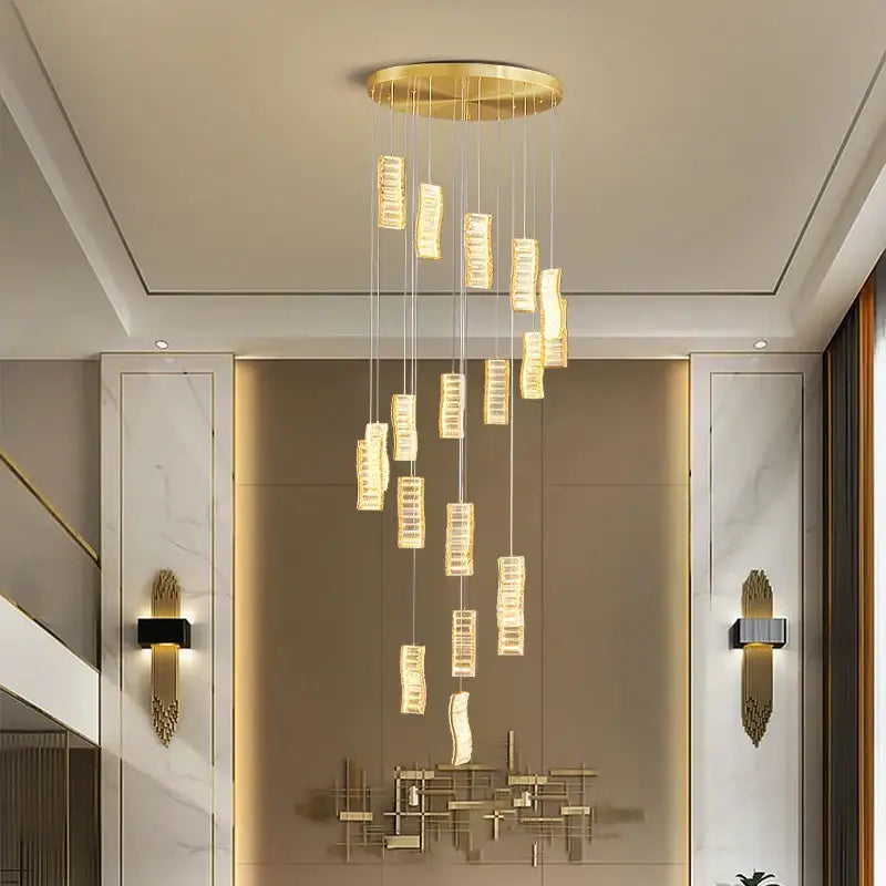 Golden circular chandelier with hanging rectangular crystal pendants from decorbites deluxe crystal spiral slinglights collection