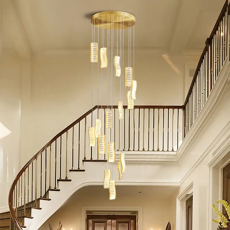 Golden circular chandelier with cascading rectangular crystal pendants from decorbites deluxe crystal spiral slinglights collection