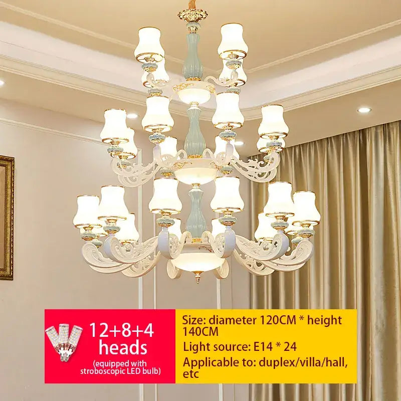 An ornate decorbites deluxe duplex living room chandelier with white and light blue ceramic body and frosted glass shades