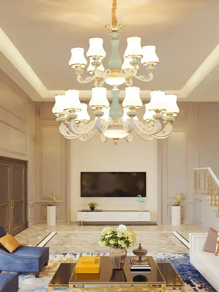 Decorbites deluxe duplex living room chandelier with a light blue central column and white glass shades on gold arms