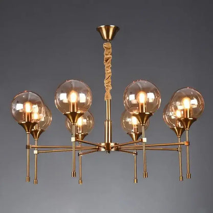 Brass-finished DecorBites™ designer metal chandelier with six glass globes and twisted rope pendant for modern living