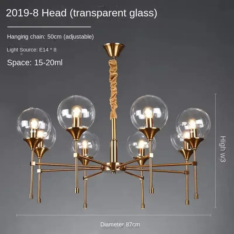 Brass-finished decorbites™ designer metal chandelier with eight transparent glass globes and adjustable hanging chain
