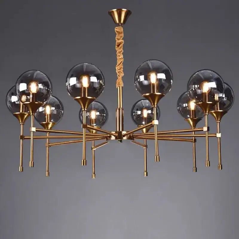 Brass-finished decorbites™ designer metal chandelier with multiple smoky glass globes and twisted rope pendant for modern living