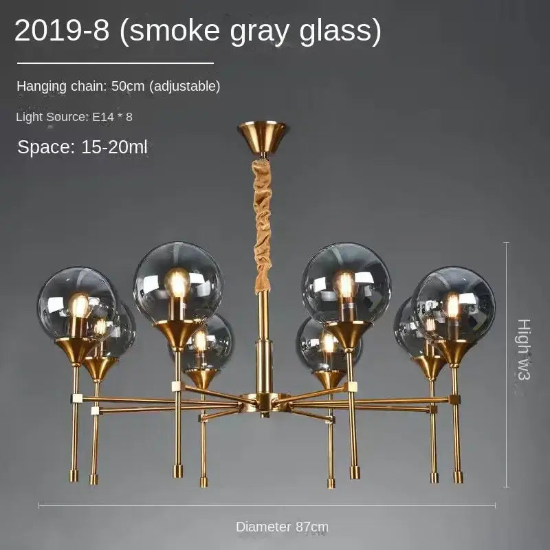 DecorBites™ designer metal chandelier with smoke gray glass, brass accents, and twisted central chain for modern living