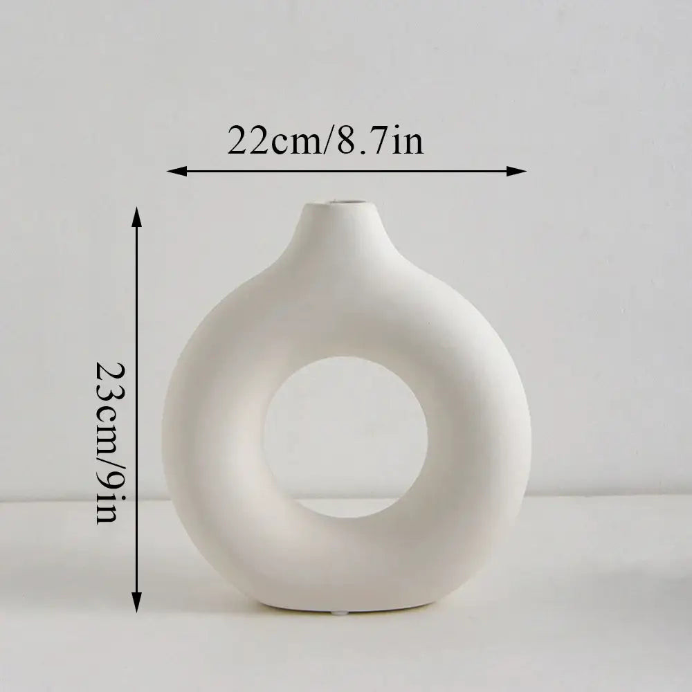 DecorBites™ white minimalist ceramic flower vase with a donut shape and smooth glossy finish