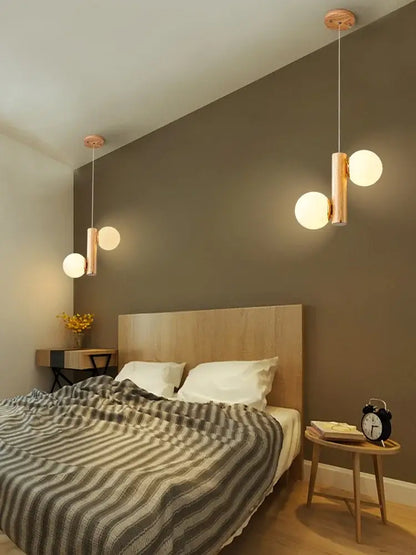 Modern gold bamboo e27 pendant lamp with copper cylindrical bodies and frosted glass globes for dining room lighting