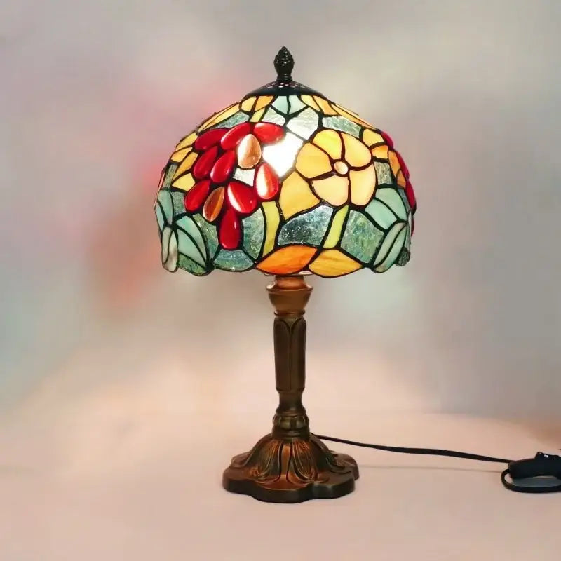 A decorbites e27 retro baroque led table lamp with vibrant stained glass floral shade and ornate bronze base for reading
