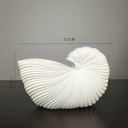 Decorbites™ elegant ceramic vase featuring a sleek white shell conch design, 22cm wide and 14cm tall
