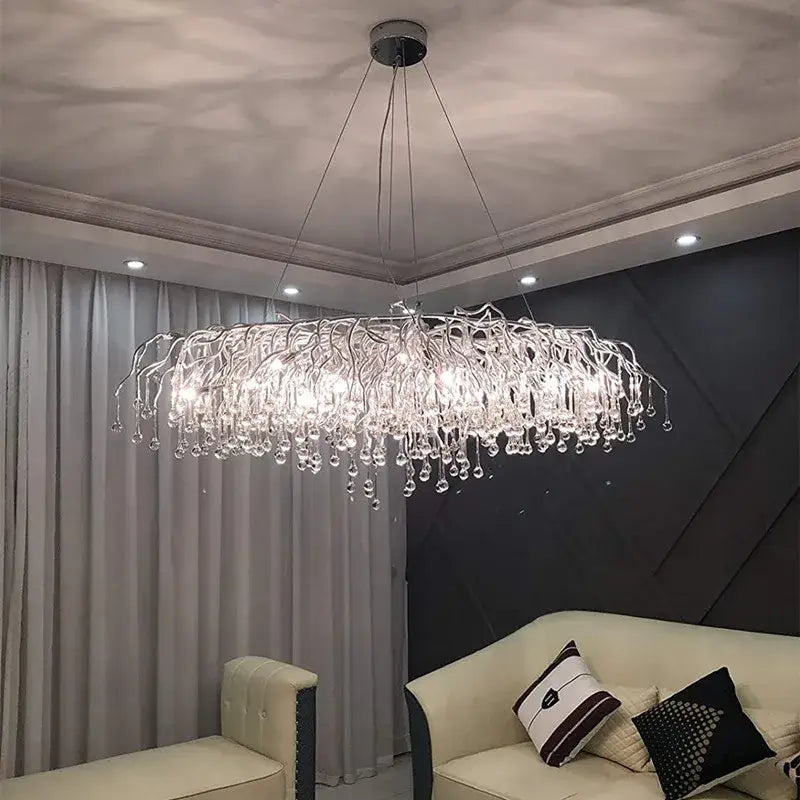 DecorBites elegant chrome crystal chandelier with silver metal frame and cascading droplets for living room lamp package