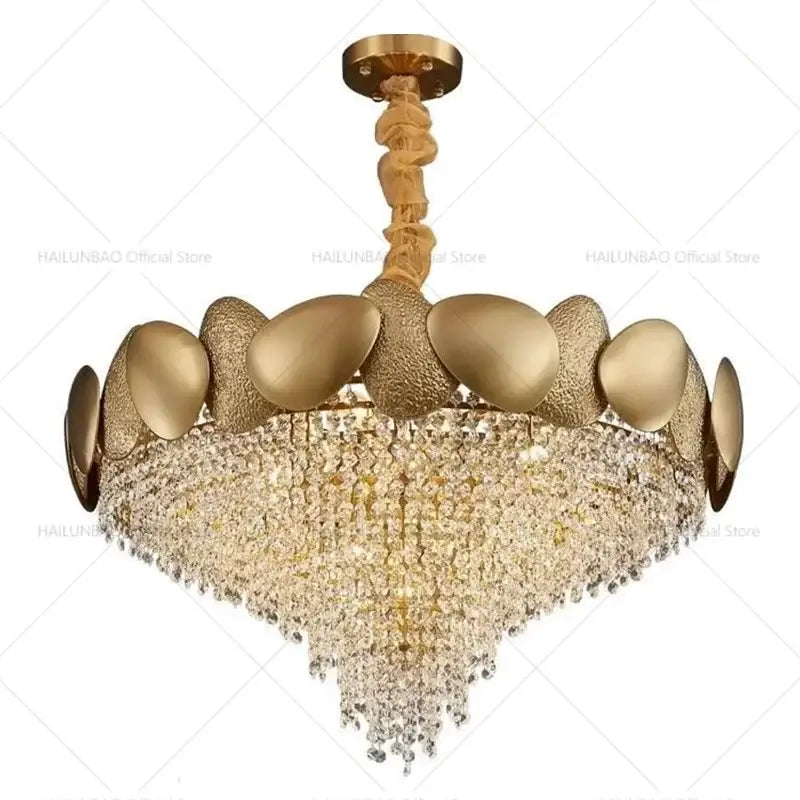 Gold-toned decorbites elegant crystal chandelier with textured shell frame and cascading crystal droplets for living room lighting