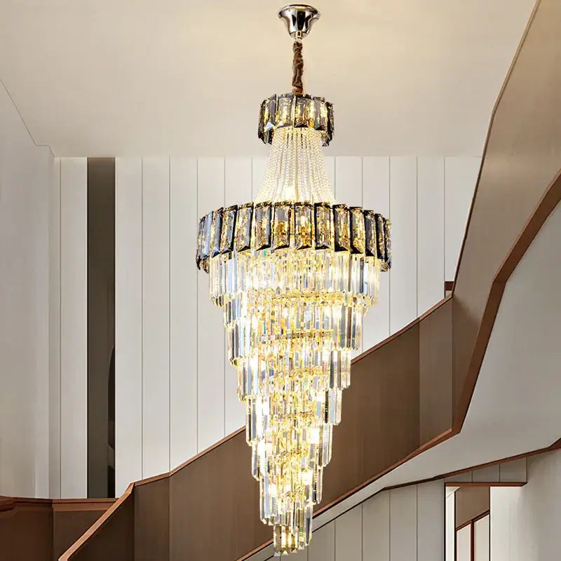 Decorbites elegant crystal multi-tiered chandelier with cascading clear and gold prisms for living room spiral staircase