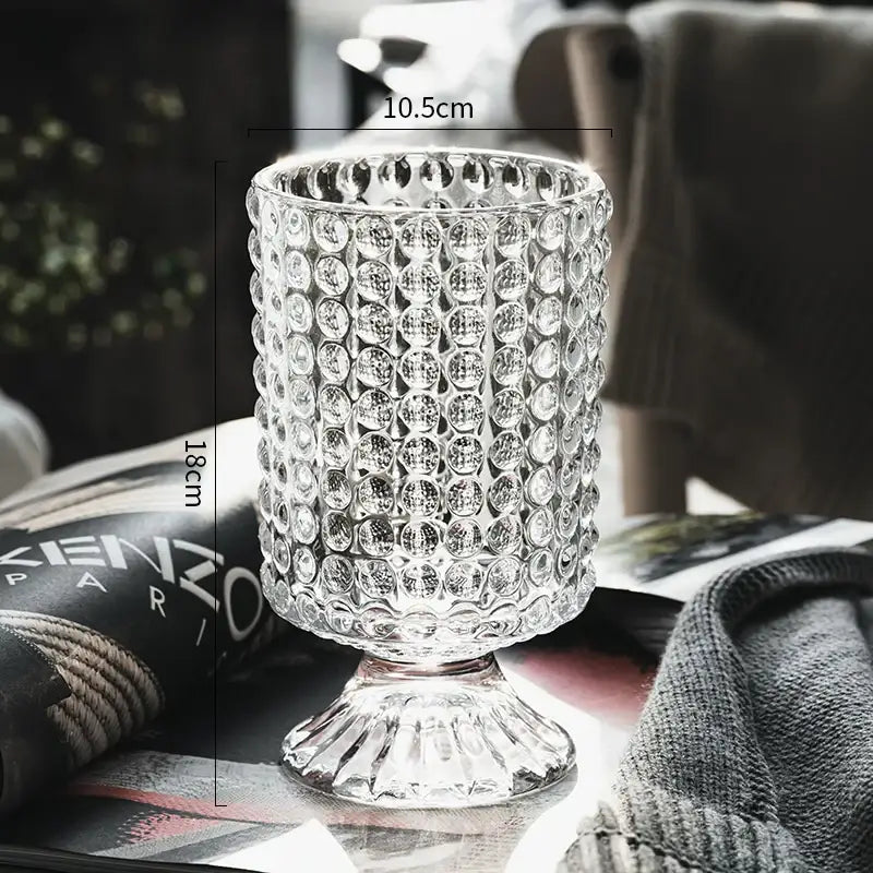 Clear glass candle holder with textured circular bumps and fluted base in decorbites crystal glass vase design
