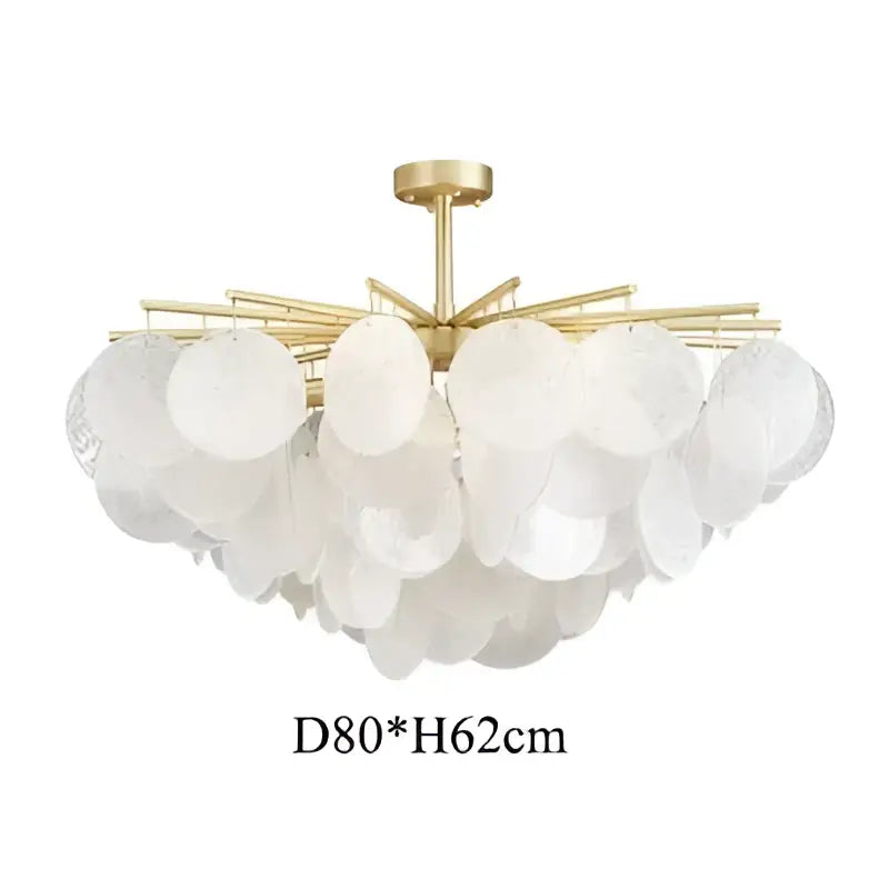 Decorbites elegant glass chandelier featuring a gold-toned frame and frosted glass discs for bedroom lighting