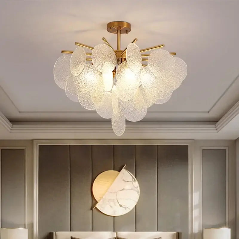 Gold-toned decorbites elegant glass chandelier with translucent textured glass petals for bedroom lighting