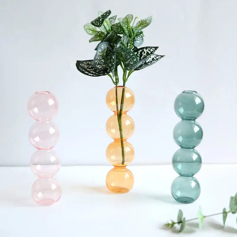 Pastel-colored glass vase with stacked spherical segments elegant glass vase for home decor by decorbites