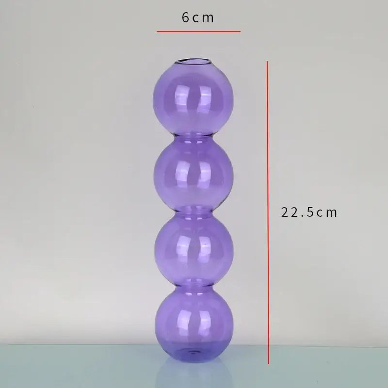 DecorBites™ elegant glass vase in tall translucent purple with four stacked spherical sections for home decor accents