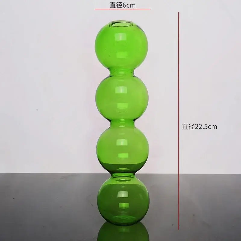 DecorBites™ elegant glass vase in translucent lime green with four stacked spherical sections for home decor