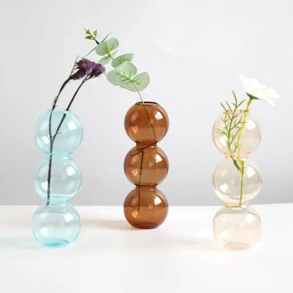 DecorBites elegant glass vase featuring three stacked translucent blue amber and peach hues for home decor