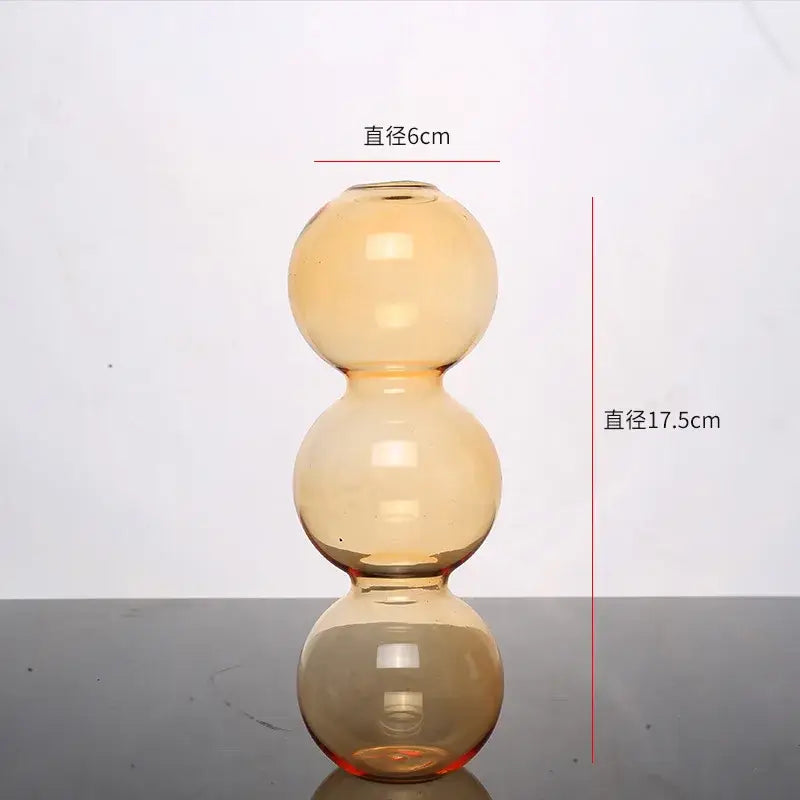 DecorBites™ elegant glass vase in translucent amber with three stacked spheres for stylish home decor accents