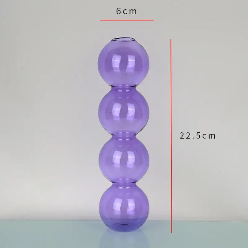 Decorbites elegant glass vase in translucent purple with four stacked spherical sections for home decor accent
