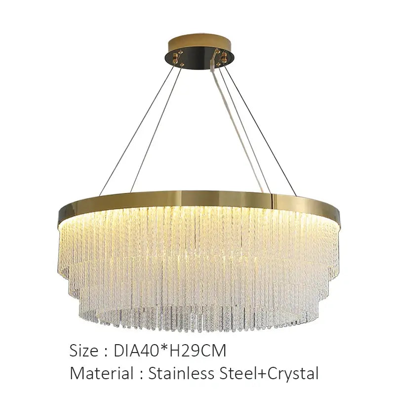A modern gold luster crystal chandelier with brushed gold stainless steel frame and cascading crystal strands for home lighting