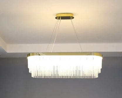 DecorBites elegant gold crystal chandelier features a modern gold luster frame with cascading clear crystal prisms