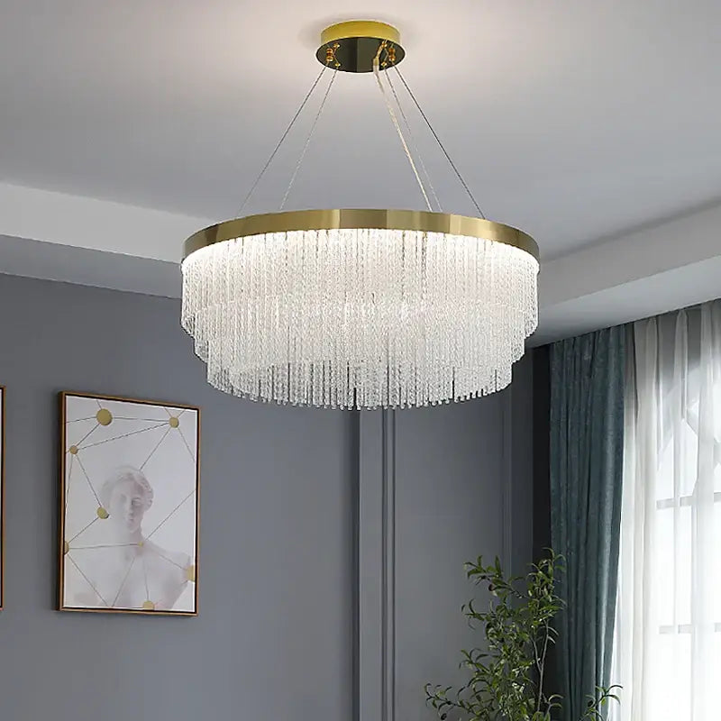 DecorBites™ elegant gold crystal chandelier with cascading clear crystals and modern gold luster for home lighting