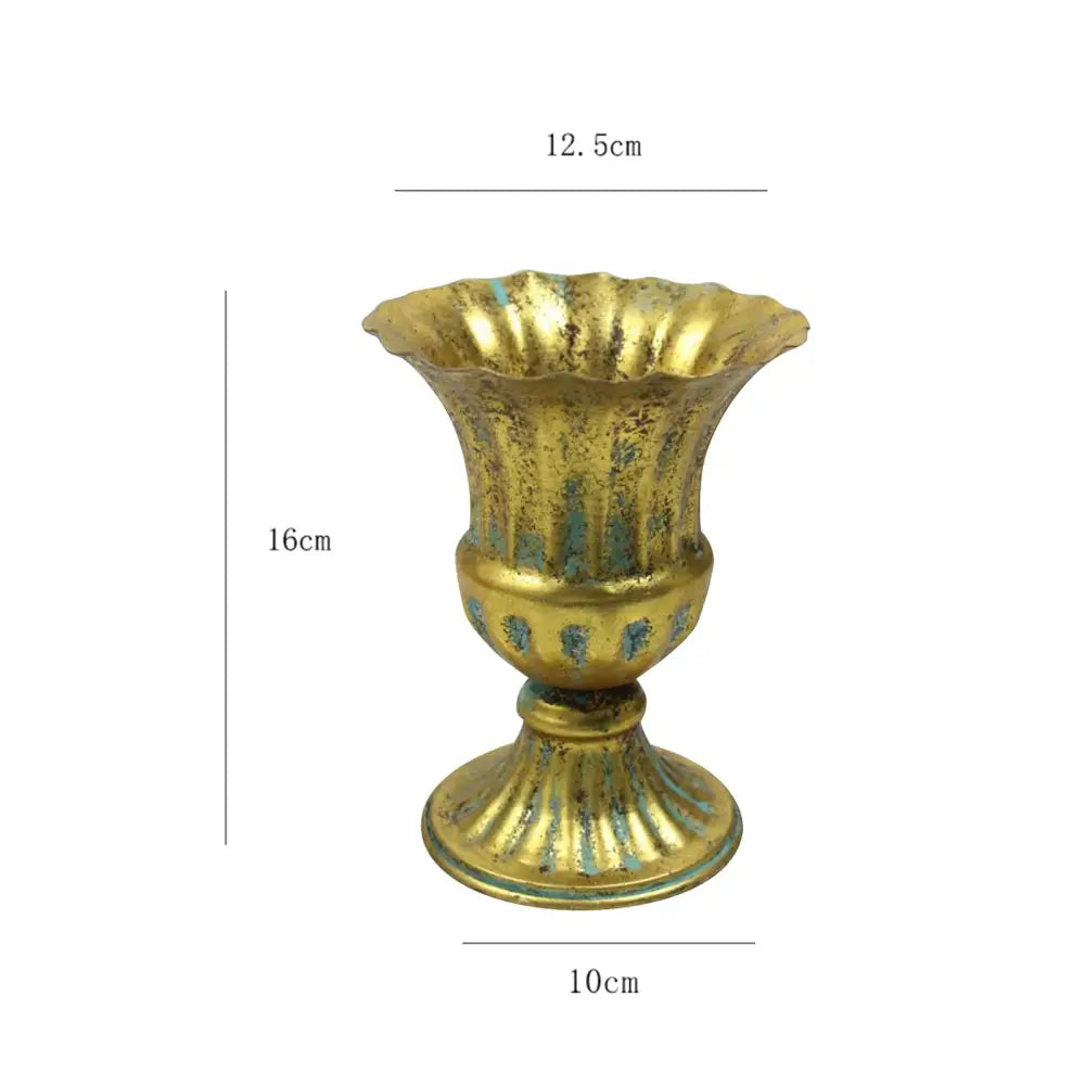 DecorBites™ elegant metal flower vase is a gold-toned metal flower vase with fluted rim and blue-green patina accents