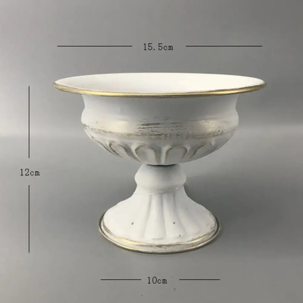 White ceramic pedestal bowl with gold trim and embossed floral detailing for decorbites metal flower vase candle holders