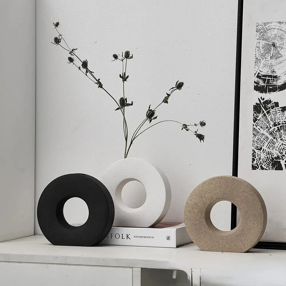 Three minimalist donut vases in black white and beige ceramic for elegant Nordic matte flower vase home decor by DecorBites