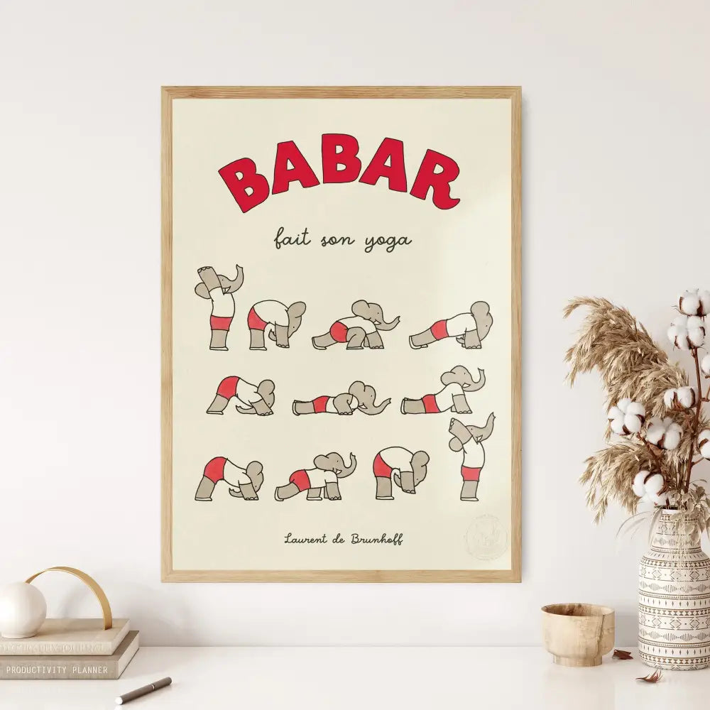A framed DecorBites™ family cartoon poster featuring Babar elephant in red and white yoga attire for kids room decor