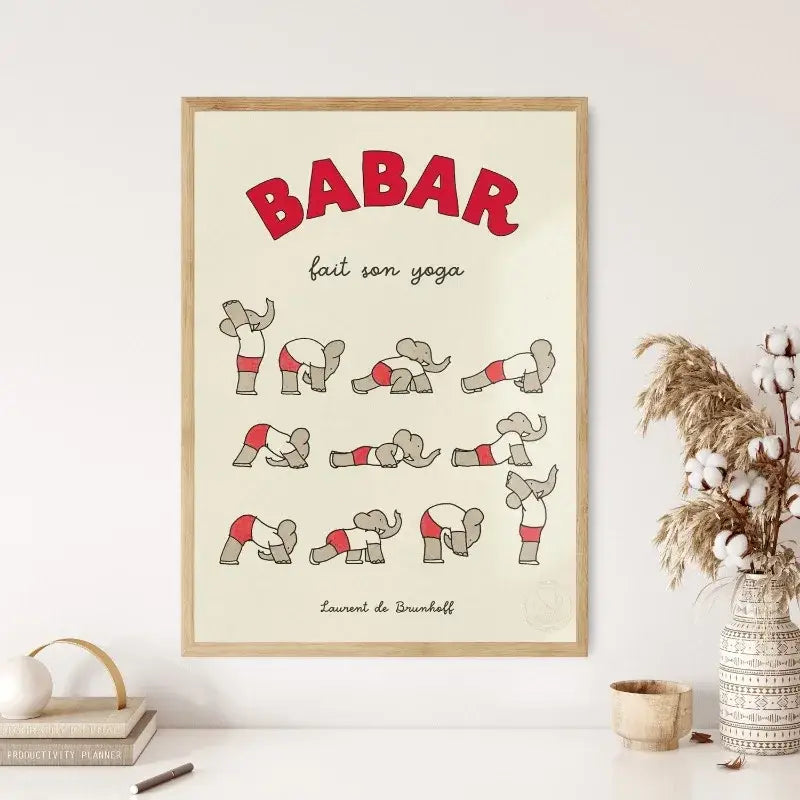 A framed decorbites™ poster featuring red and gray cartoon elephant babar family doing yoga for kids room decor