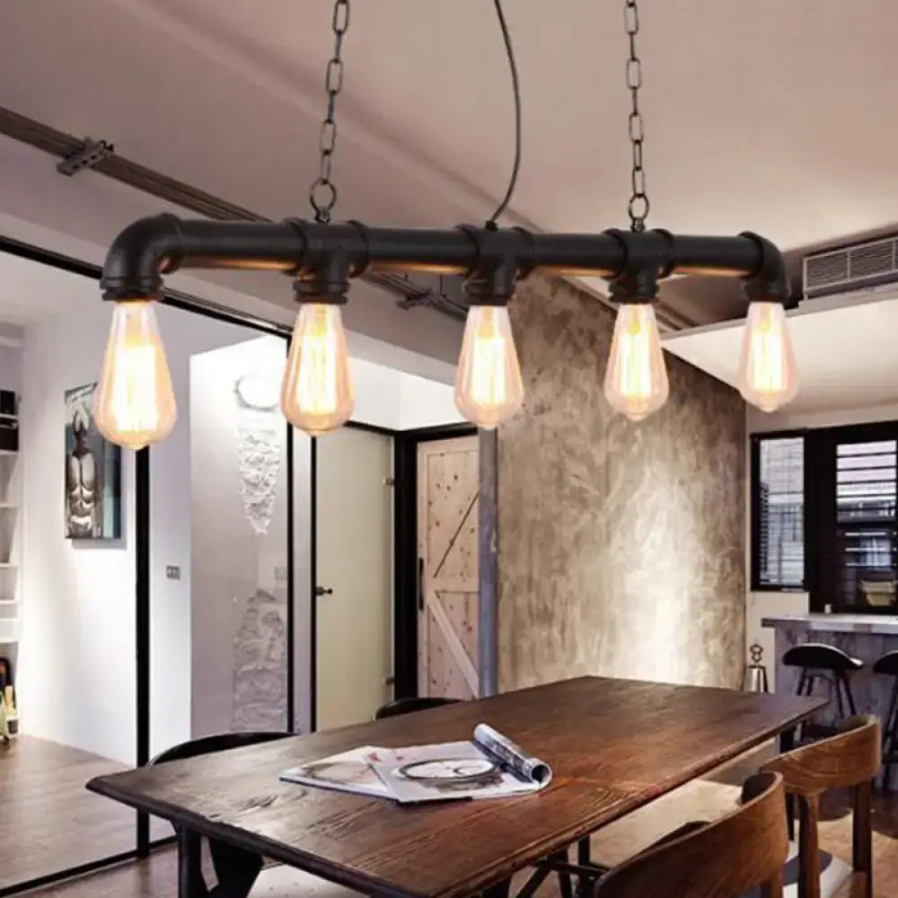 DecorBites elongated pipe island pendant light with five exposed filament bulbs in black industrial pipe design