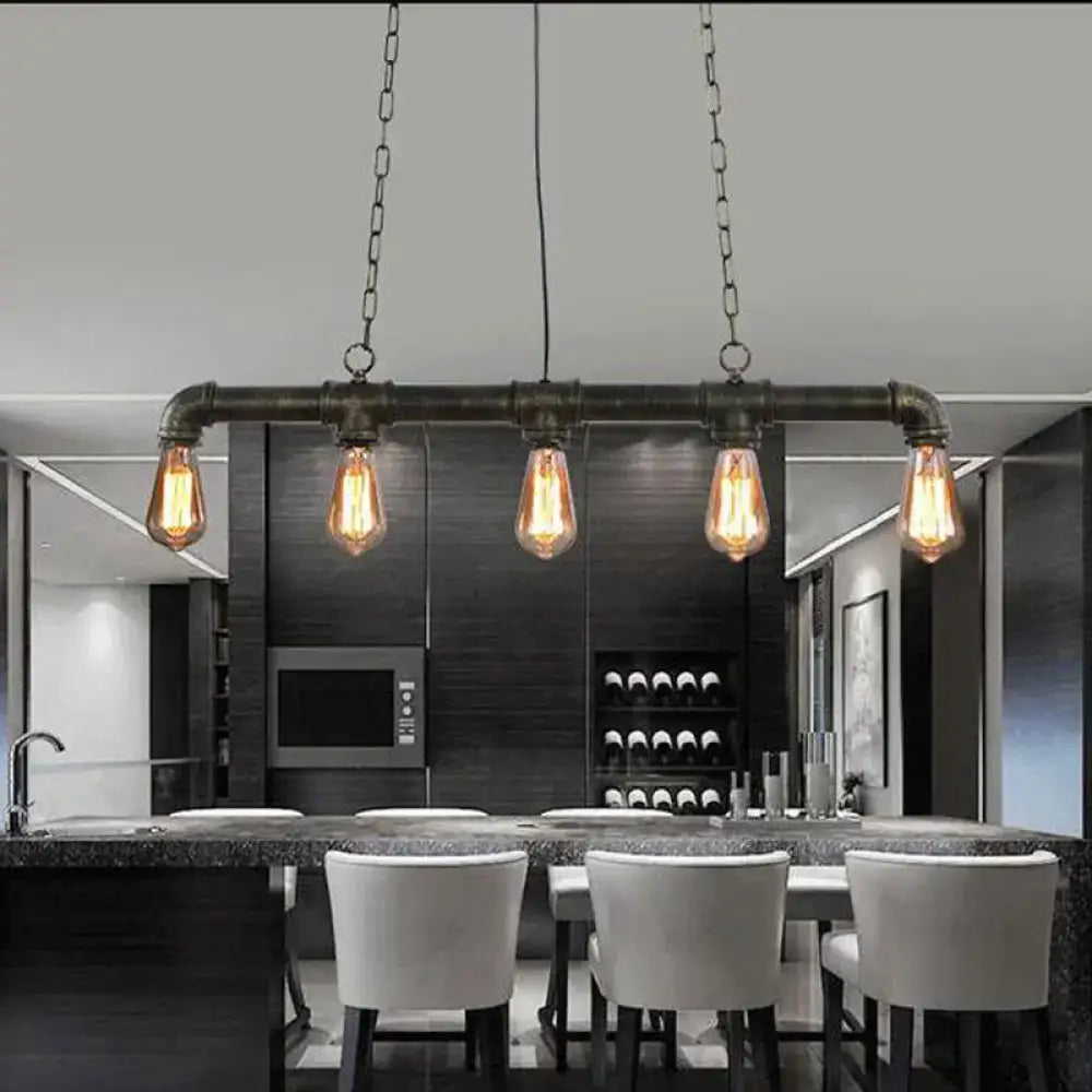 Decorbites elongated pipe island pendant light with five black pipe heads and exposed filament bulbs for dining room