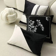 Black velvet cushion cover with white embroidered bamboo design and chain-stitched border by decorbites embroidered black white