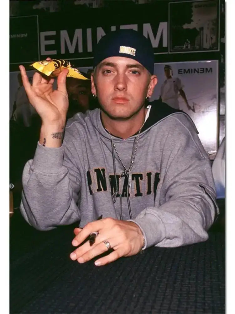 Decorbites™ eminem canvas wall art features eminem in a gray hoodie with innati print for stylish home decor