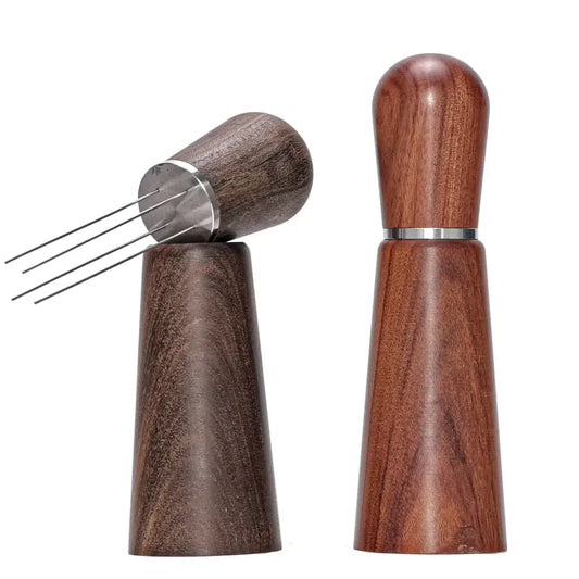 Two wooden decorbites espresso stirrers with metal accents, one conical base and four metal tines for espresso grounds distribution