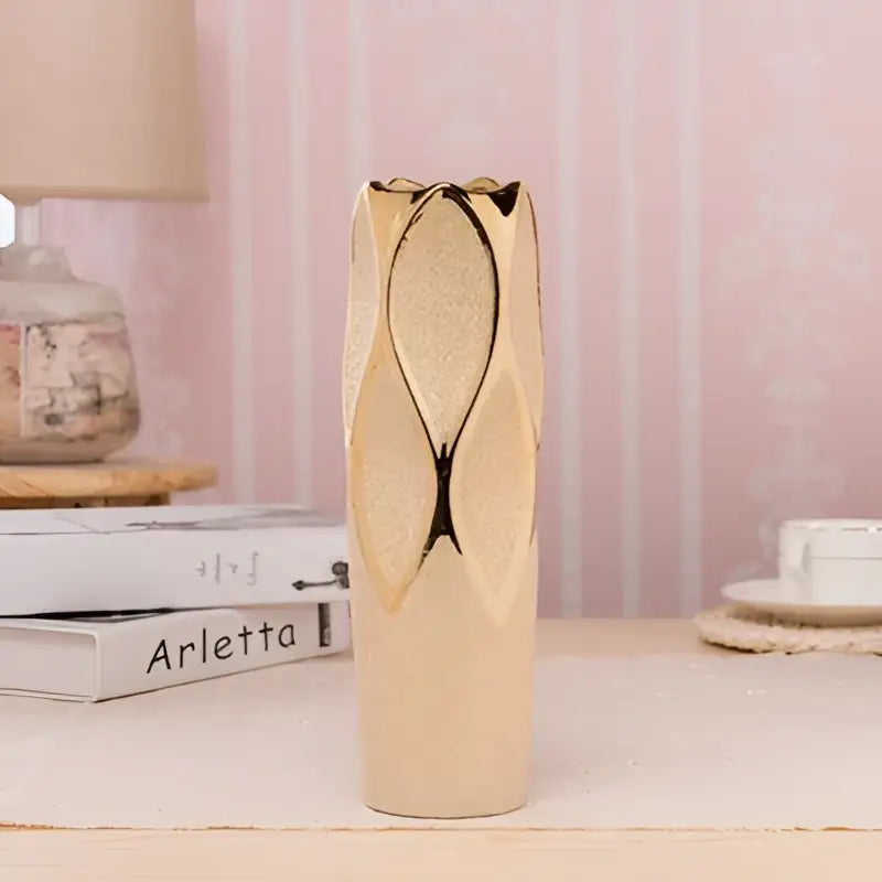 DecorBites Europe gold-plated ceramic vase with textured leaf design ideal for elegant home decor accents