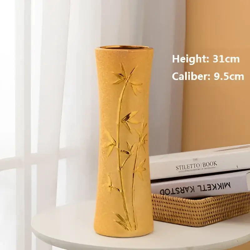 Golden ceramic vase with embossed bamboo design gold-plated ceramic vase for home decor by DecorBites Europe