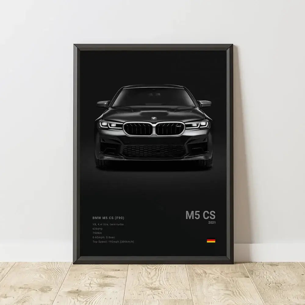 Black framed famous cars canvas wall art print featuring a matte bmw m5 cs f90 2021 with kidney grille and aggressive front fascia