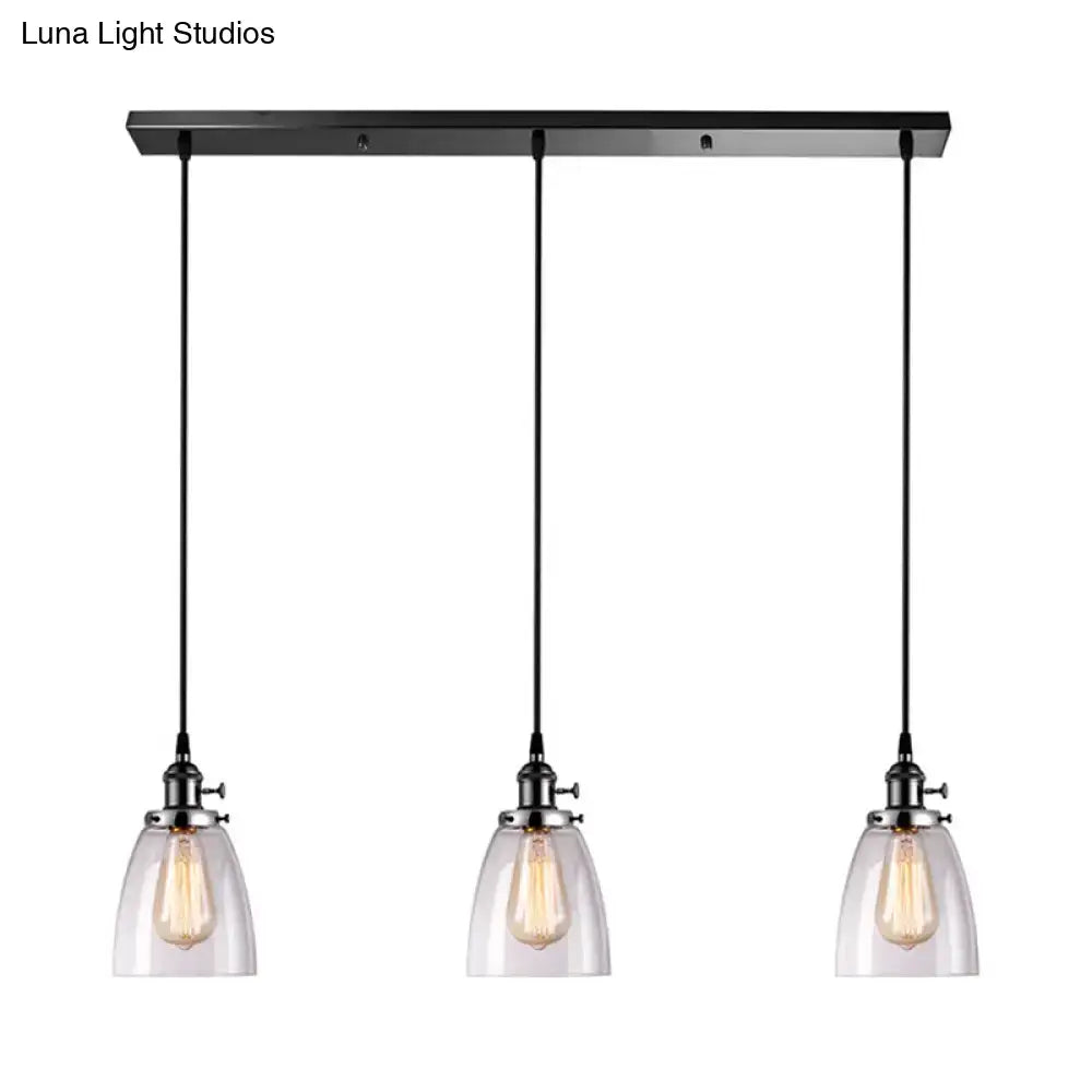 Decorbites farmhouse pendant light with black metal linear canopy, three clear glass ribbed shades, and exposed bulbs