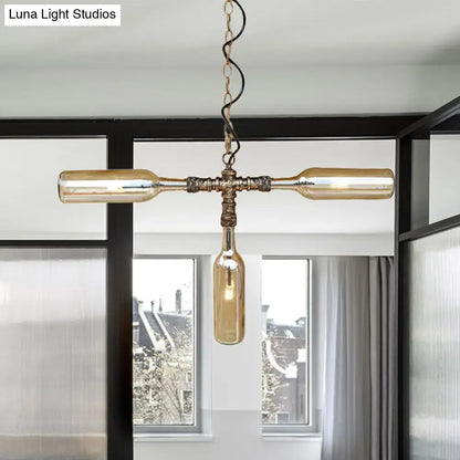 Vintage-style brass-finished chandelier with three amber glass wine bottles in aged silver black farmhouse ceiling lighting