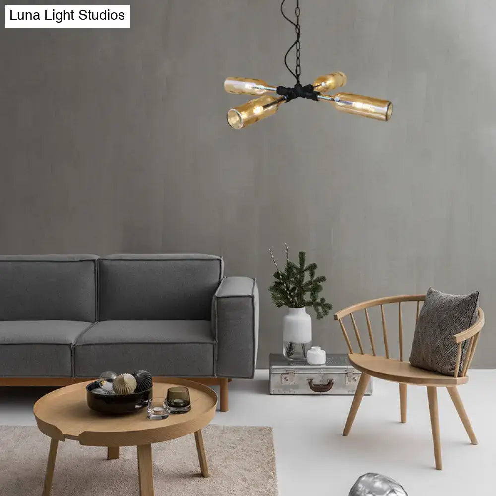 Modern brass-finished chandelier with five cylindrical glass shades in aged silver black smoke gray blue frame