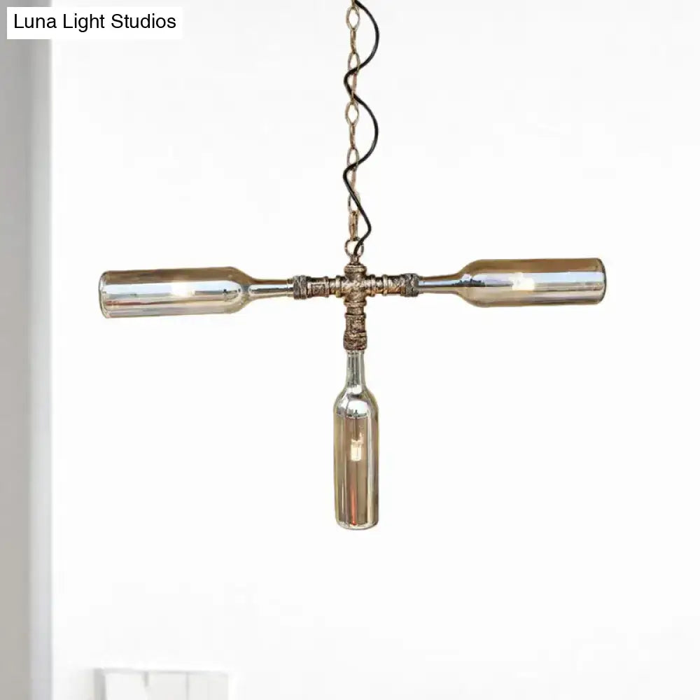 Rustic industrial pendant light with three clear glass wine bottles in aged silver black farmhouse style smoke gray blue