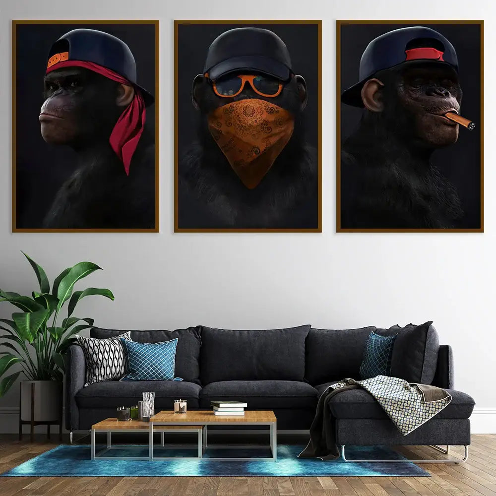 Set of three framed monkey wall art pieces featuring chimpanzees in stylish urban streetwear for premium home decor