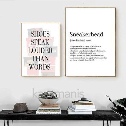 Two framed gold sneaker box canvas wall art prints with minimalist black text on white backgrounds for decorbites wall art