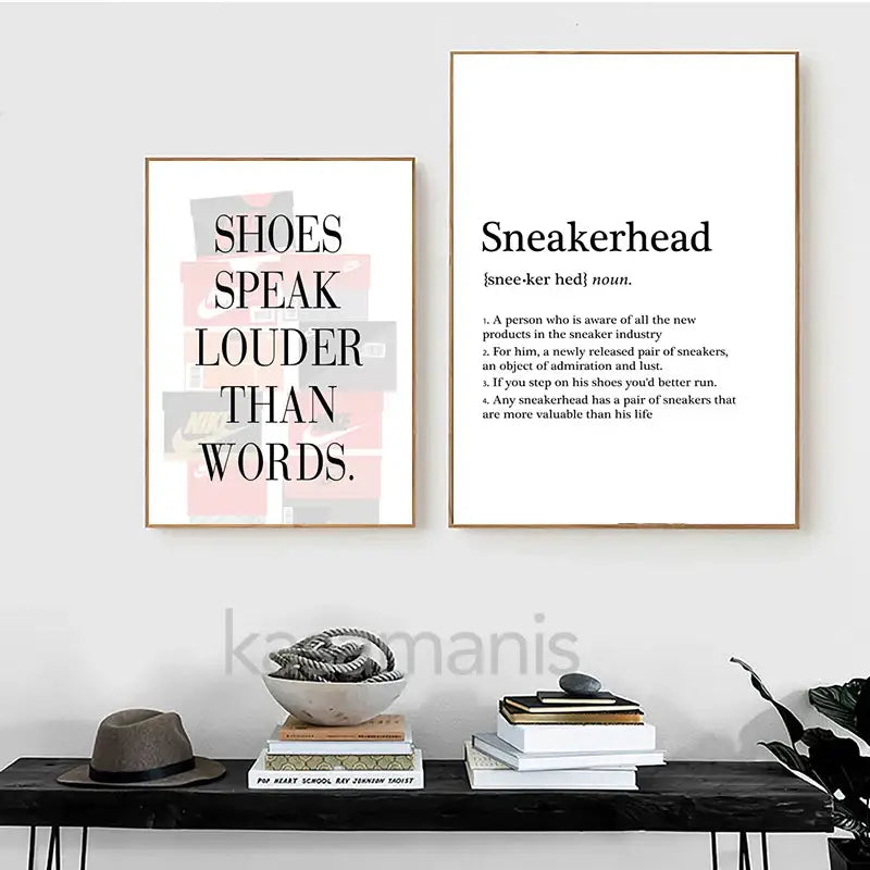Two framed decorbites sneaker box canvas wall art prints with minimalist black text in gold frames on white backgrounds