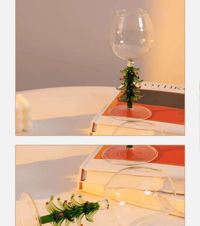 Clear glass wine glass with green hand-blown christmas tree stem and red berries for festive christmas wine use