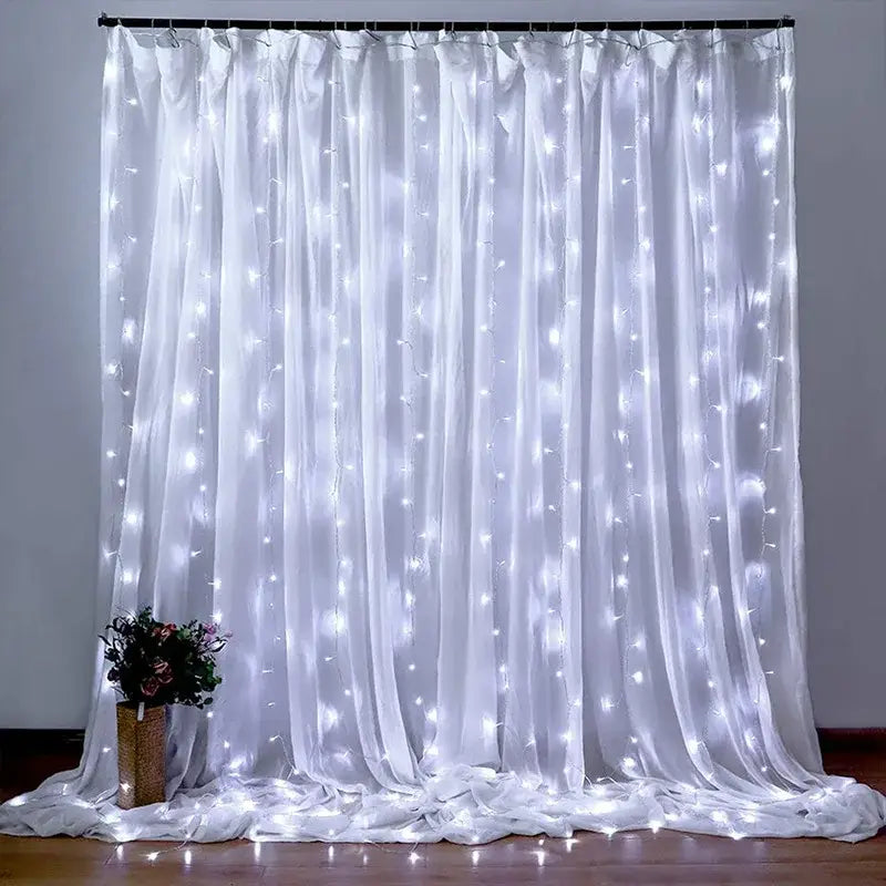 White sheer curtain decorated with DecorBites™ festive USB fairy lights curtain set available in 6x3m and 3x3m sizes